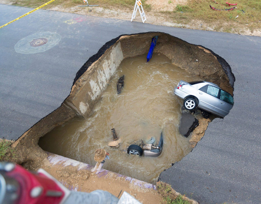 Deputy killed by sinkhole