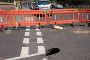 Homes evacuated after HUGE sinkhole opens up on A26 in Kent