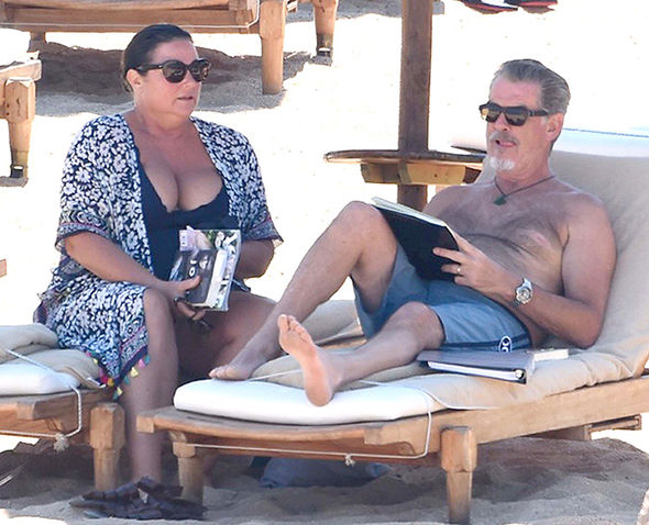 Pierce Brosnan wife Keely Keely Shaye Smith swimsuit beach cleavage